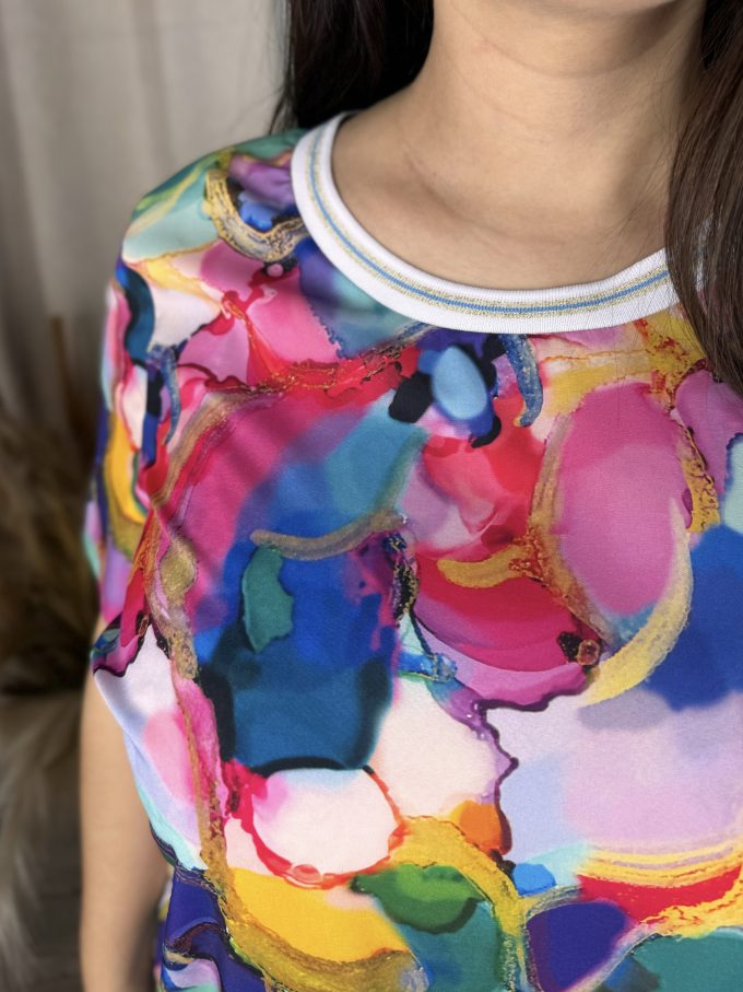 Blouse with decorative ribbing