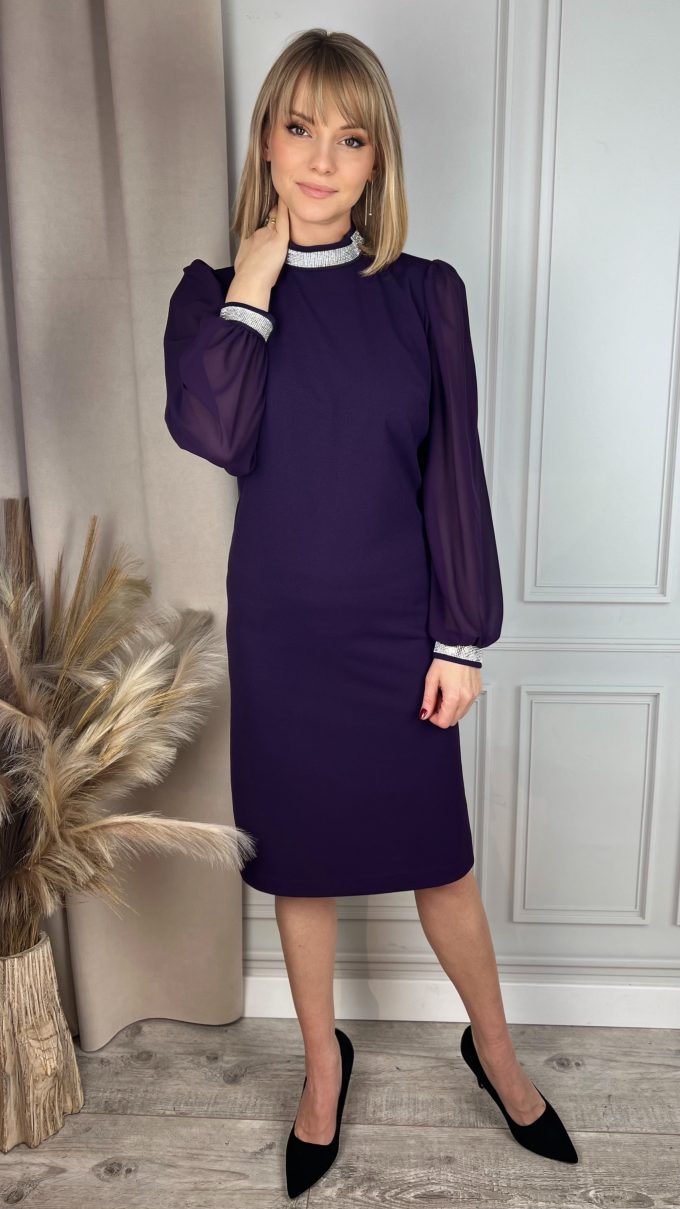 Dress with decorative ribbon