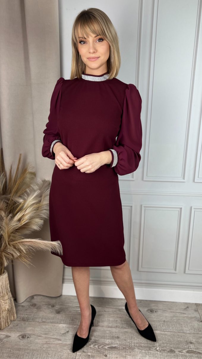 Dress with decorative ribbon