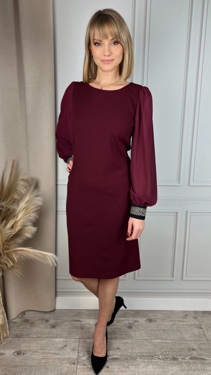Dress with decorative elastic band