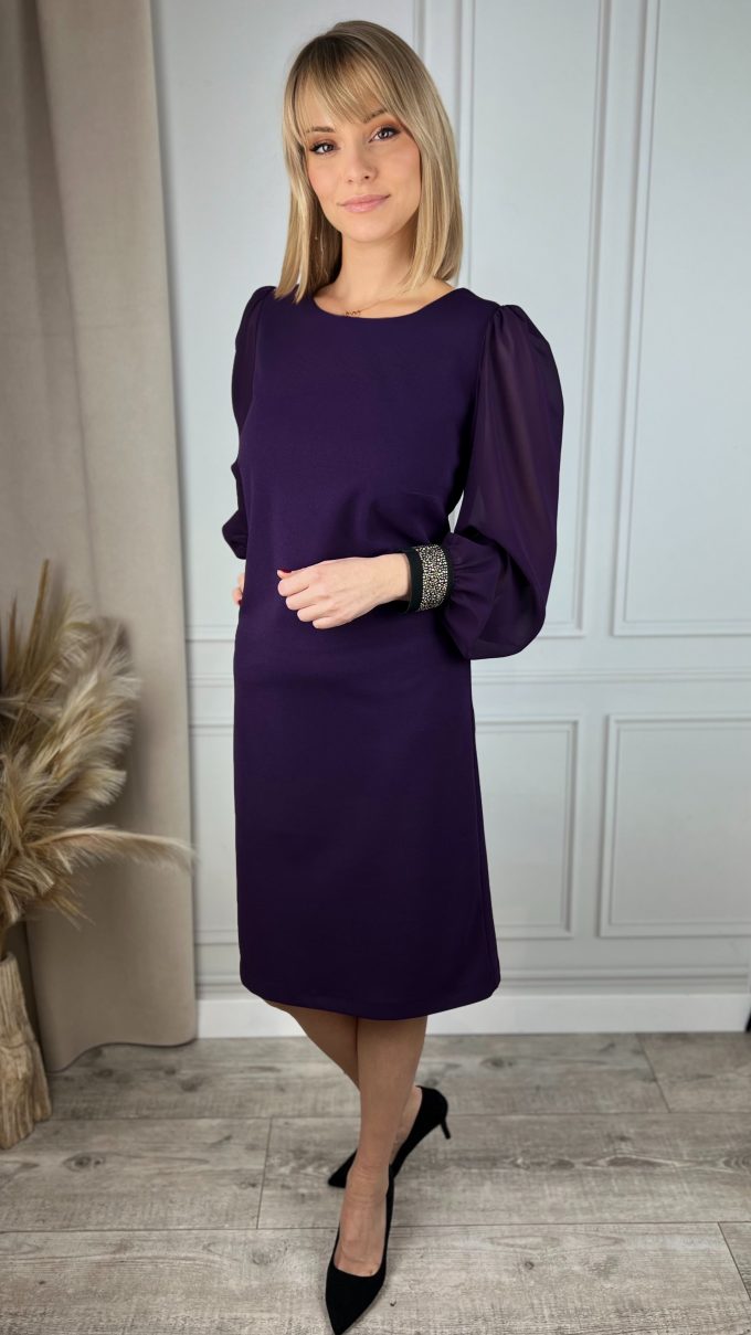 Dress with decorative elastic band