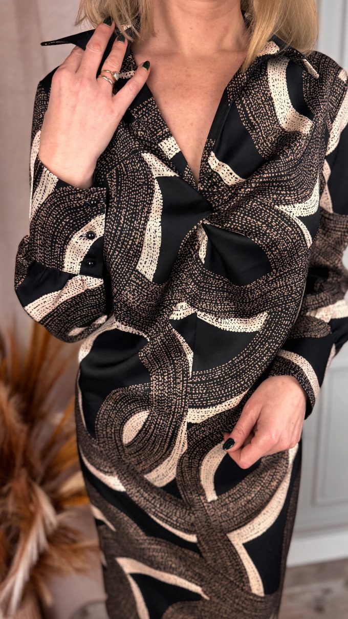 Dress with decorative neckline